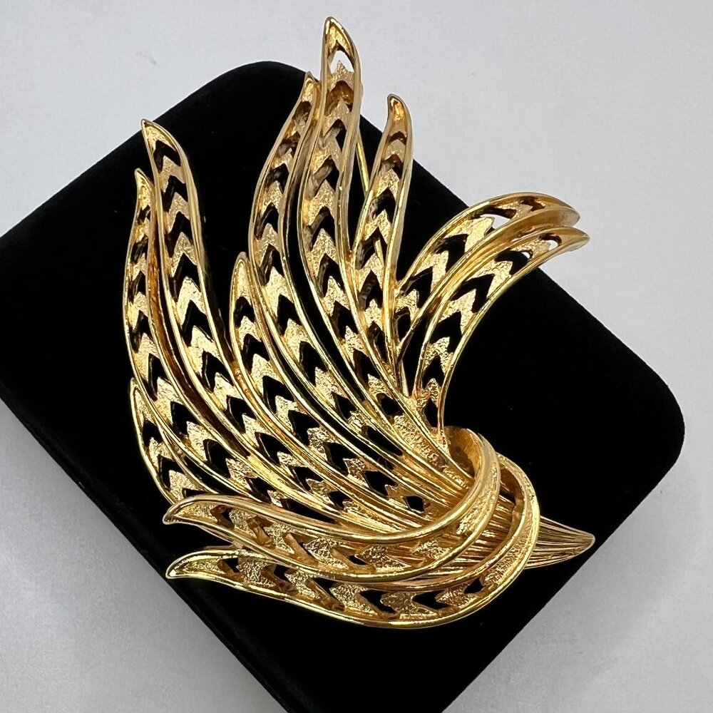 Monet Flowing Chevron Cutout Brooch